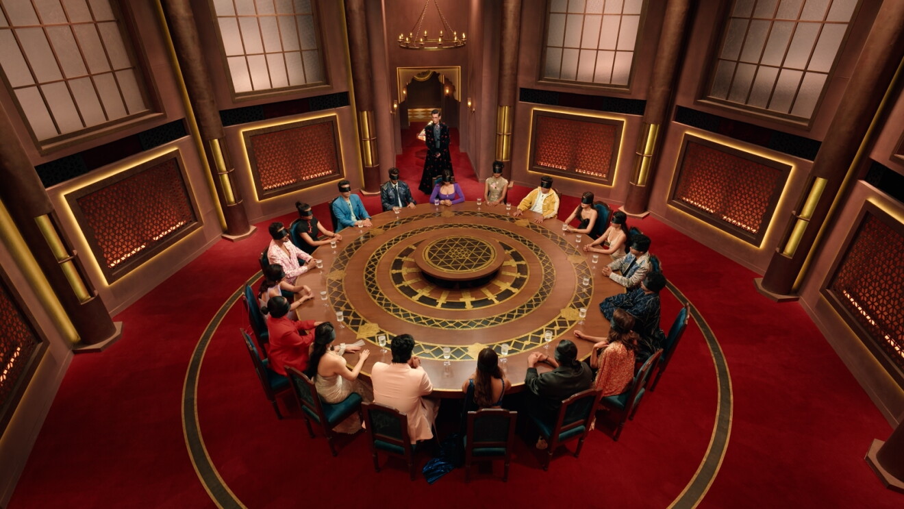 Still image of people at round table from 'The Traitors India'