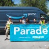 amazon employees standing in front of a truck