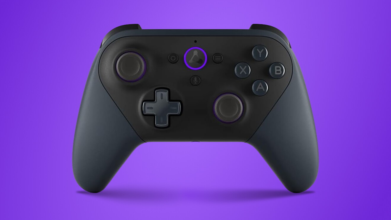 Black Luna game controller with purple accents on vibrant purple background