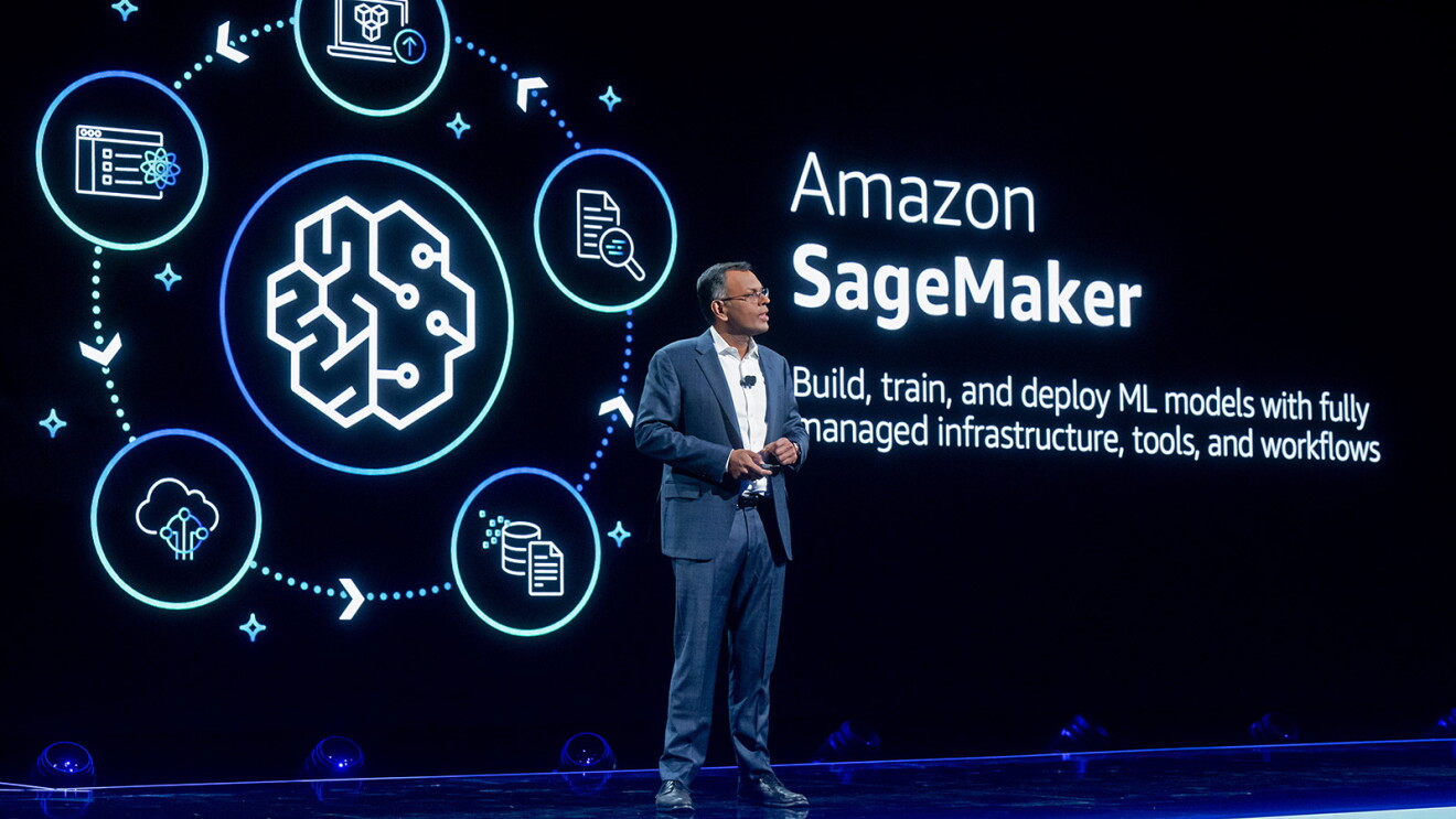 A photo of AWS Vice President of Data and AI Swami Sivasubramanian at AWS re:Invent 2023, presenting about Amazon SageMaker.