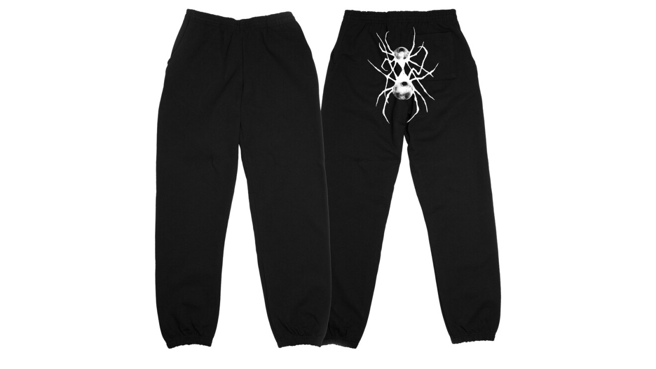 Black sweatpants with a white image of two spiders holding each other on the backside.