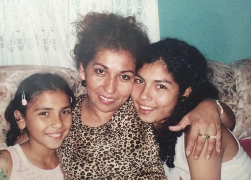 Photo of two girls and a woman.