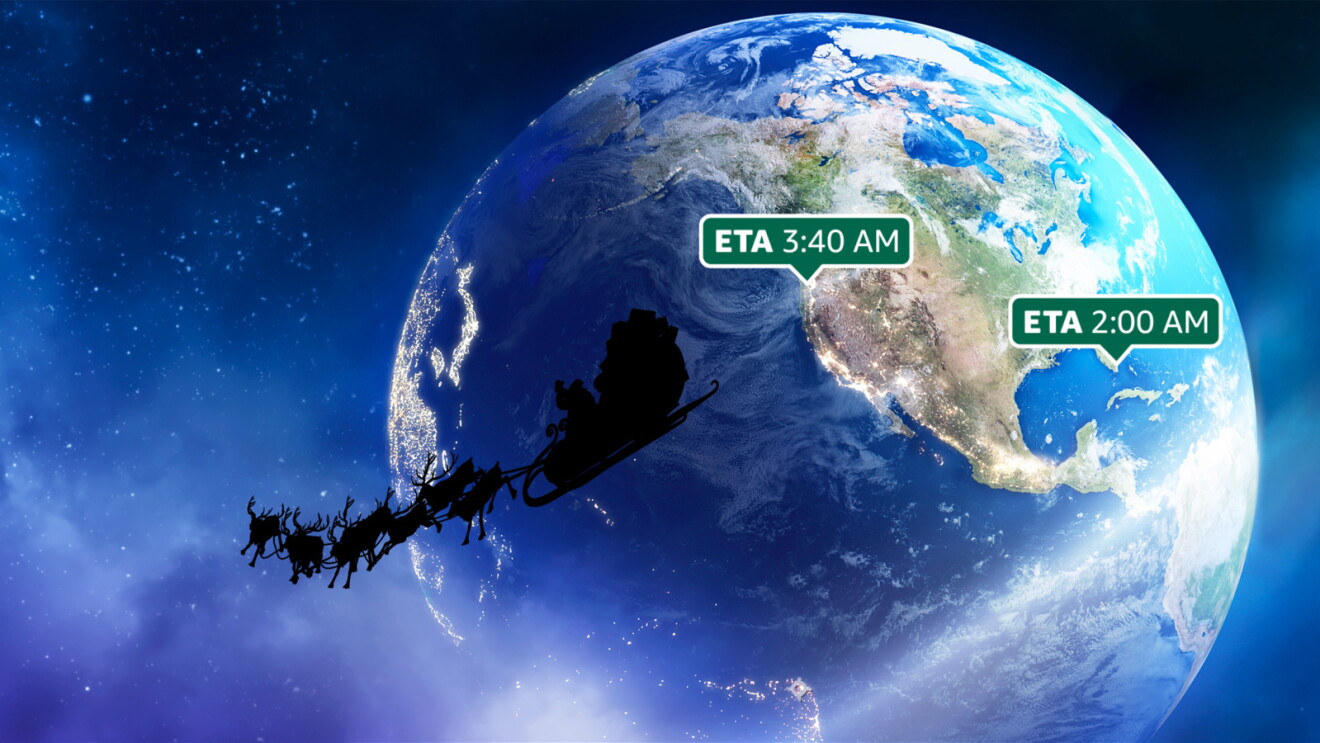 A still image of reindeer pulling Santa in a sleigh around Earth.