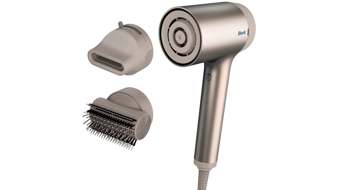 An image of the light-gray Shark hairdryer with two attachments.