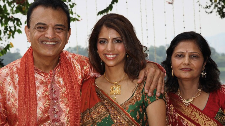 Indian Parents and their daughter on her wedding day