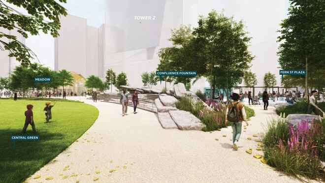 亚马逊第二总部的外观效果图。有一条宽阔的铺好的人行道,四周绿草成荫,远处是高楼大厦。