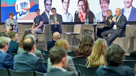 Stefano Perego speaks on a panel at Journée de l'Economie in Luxembourg
