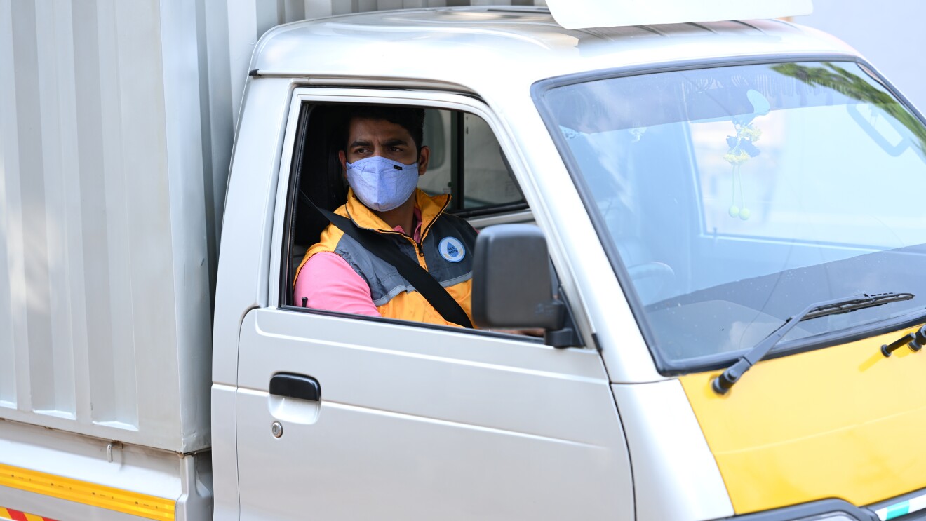 DSP who runs a logistics business sits in his van