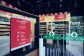 Devanture d'un magasin 'Just Walk Out' affichant les options de paiement sans espèces au restaurant Faim