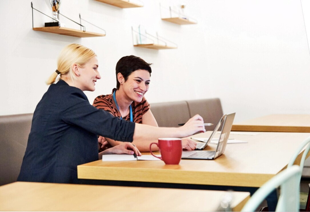 Amazon female employees having a discussion about ideas