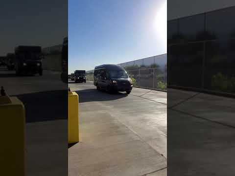 Amazon trucks full of packages