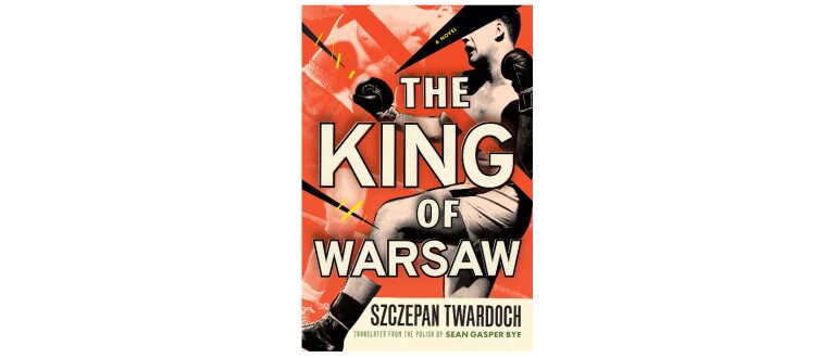 The book cover of "The King of Warsaw" is a vintage orange color. The cover features a male boxer wearing shorts and boxing gloves punching his opponent whose image is faded.