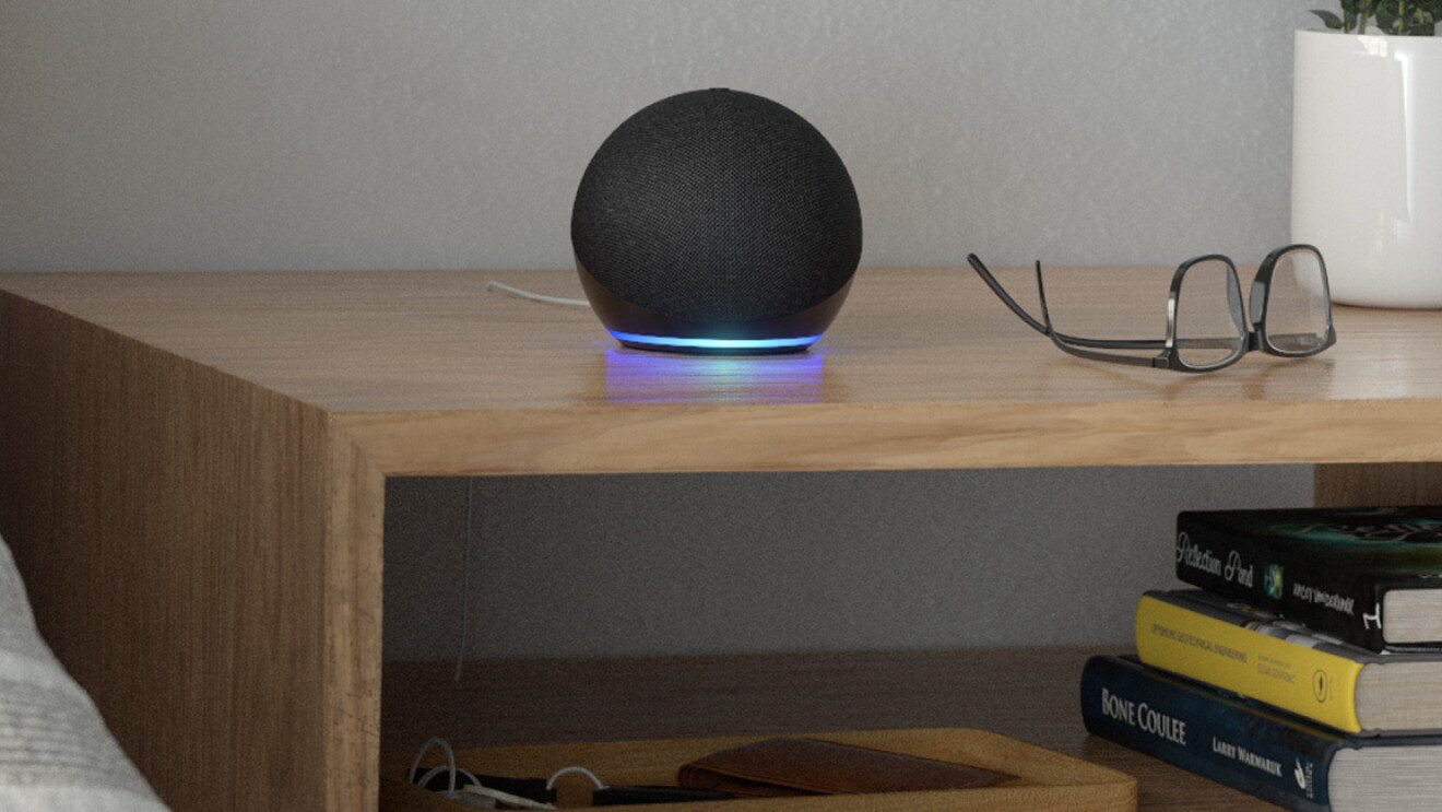 Echo device standing on the bed-side table 