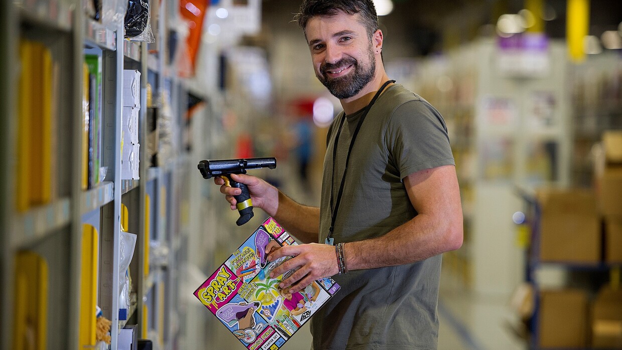 Fotis Karounias, fulfilment centre employee at Amazon in Gourock, pictured at work