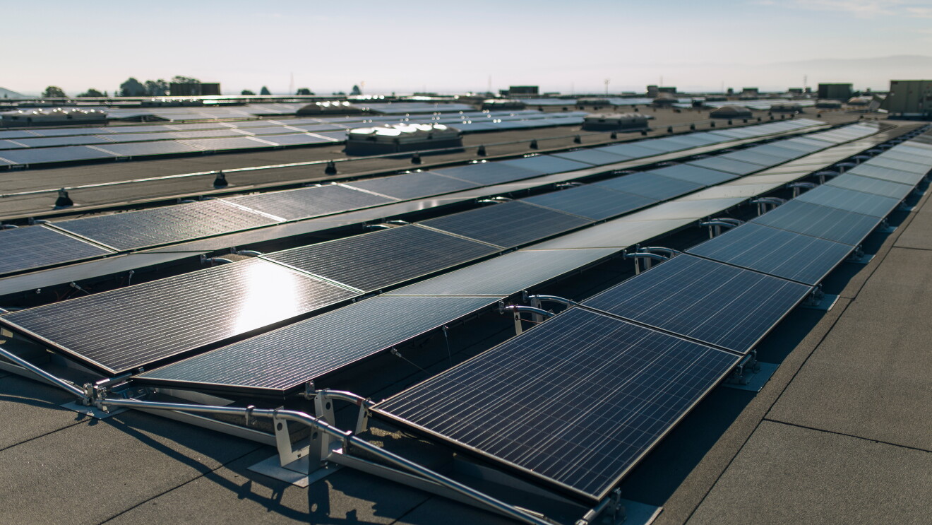 Solar panels on the rooftop of an Amazon fulfillment center