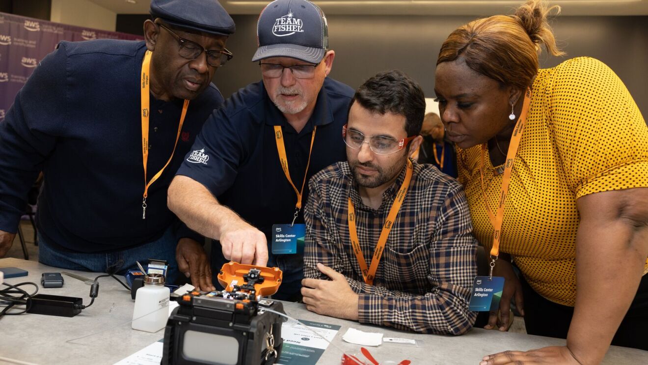 Amazon employees collaborating on robotics project