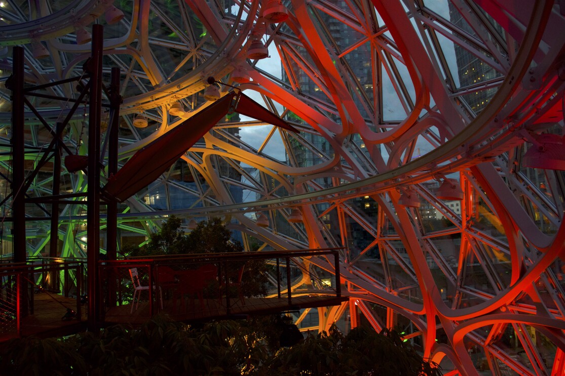 The Seattle Spheres at Amazon HQ in Seattle, WA lit up in rainbow colors to mark LGBTQ Pride month in June.