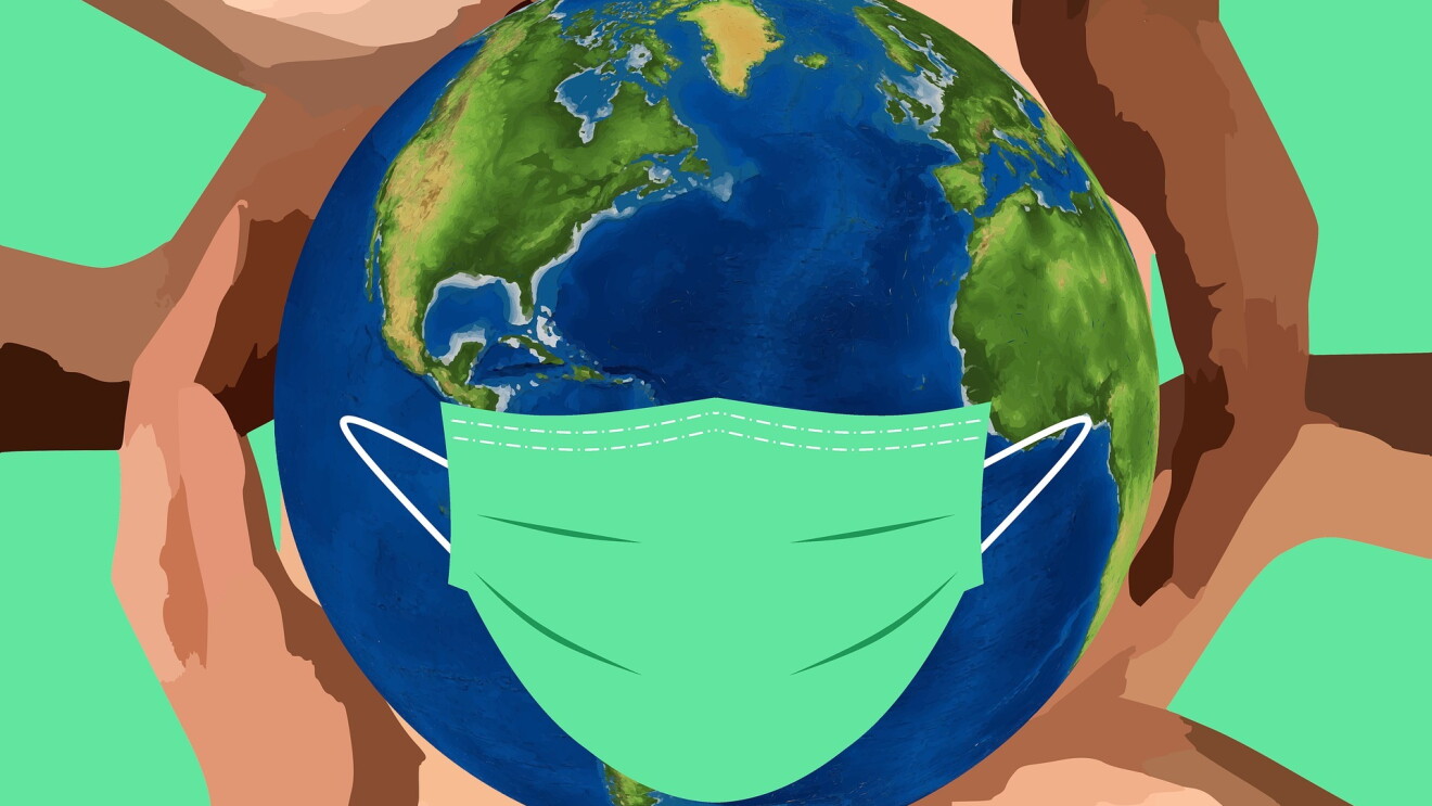 A picture of many hands holding a globe with a mask - symbolic of people coming together to help