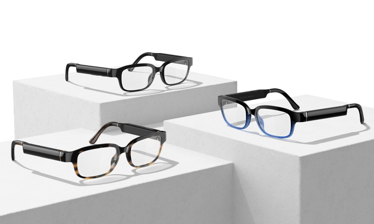 An image featuring three pairs of Amazon's new Echo Frames glasses. The first pair is tortoise shell and black, the second is all black, and the third is blue and black.