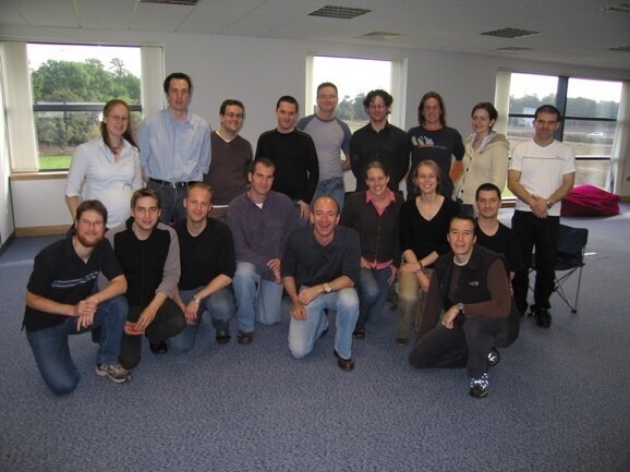 group shot of Jeff Bezos, Matt Round and the rest of the original team. 2004