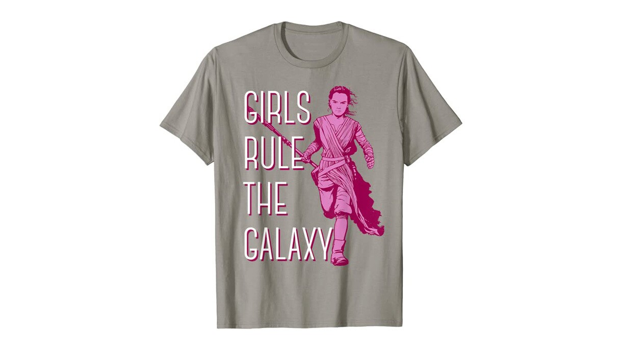a shirt that says "girls rule the galaxy" with an image of Rey from Star Wars on it