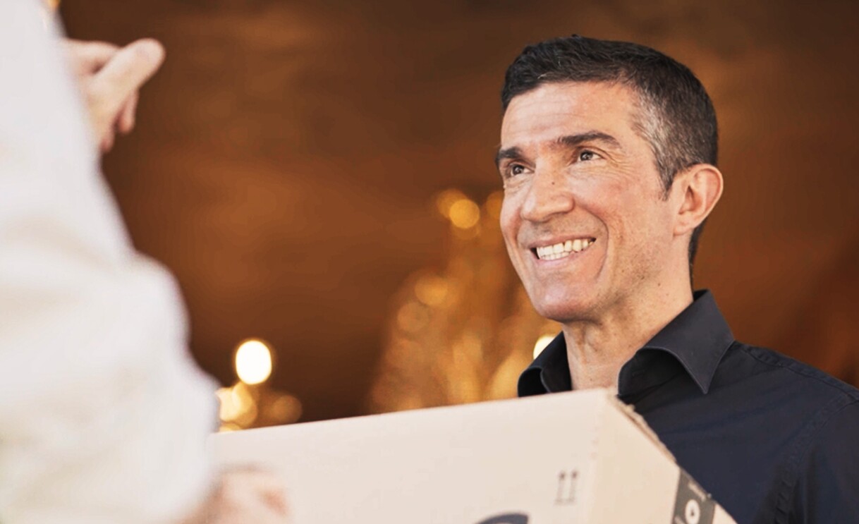 Photos of an aerial view of the Lagoon and an Amazon delivery driver handing over a delivery to a customer at his doorstep.