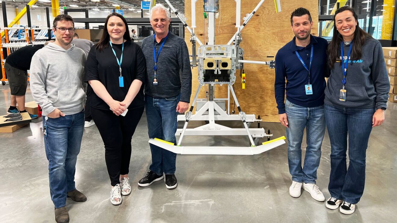 Some of the members of the Prime Air team that helped build and design the MK30 delivery drone.