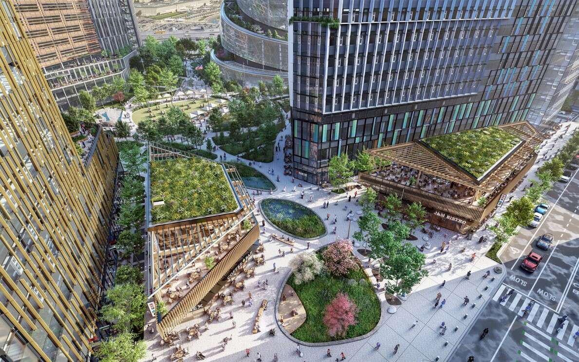 An image from HQ2 showing PenPlace, an outdoor area that will provide more than 100,000 square feet of retail space for dining, shopping, and a childcare facility. Multimodal pathways will connect throughout the site to prioritize access by foot and bike.