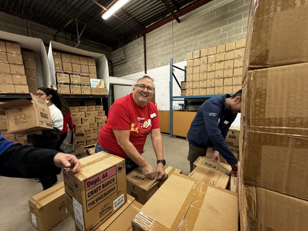 AMZL’s Brian Janaway sorting toys for CP24 CHUM Christmas Wish