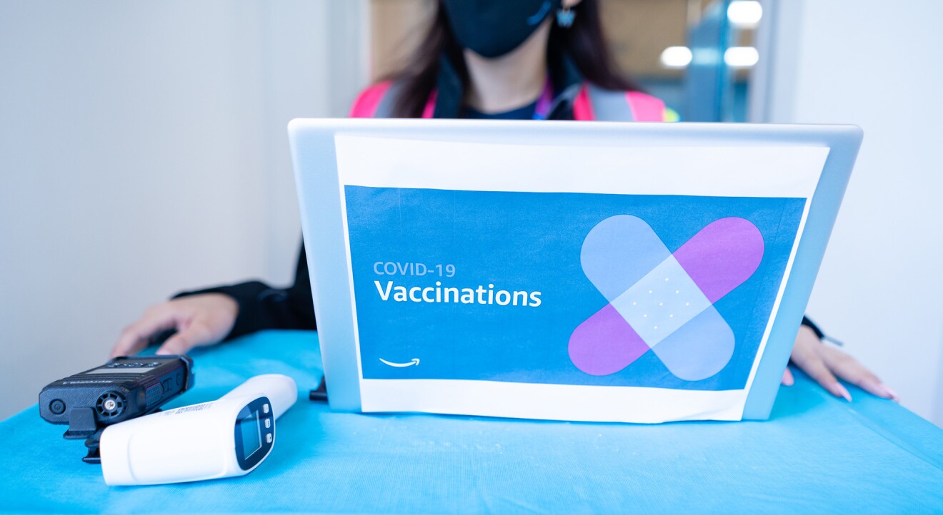 Amazon employee at a COVID-19 vaccination event