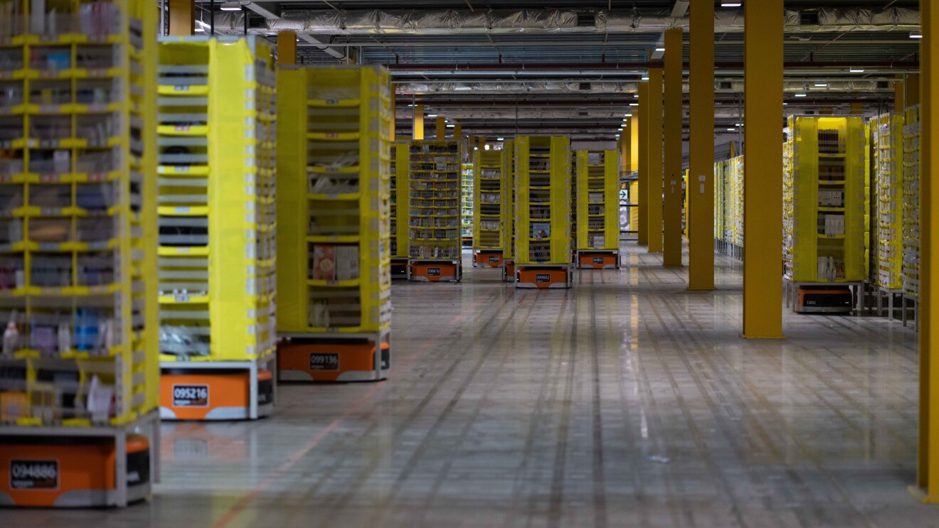 Robots working in the stow area of a fulfilment centre