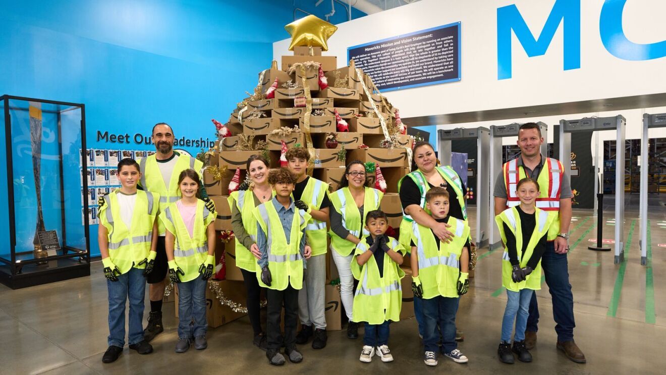 Kids join their parents at work at an Amazon Fulfillment Center.