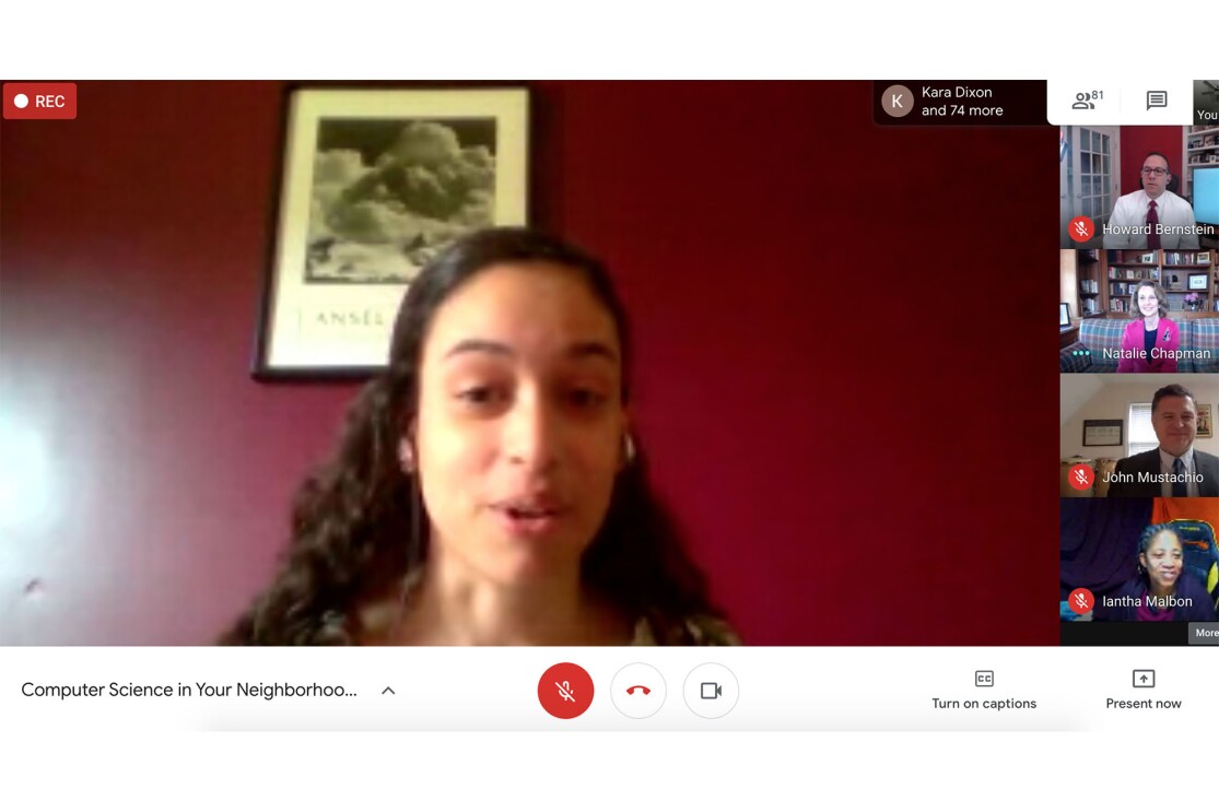 A woman on a laptop computer, working from home