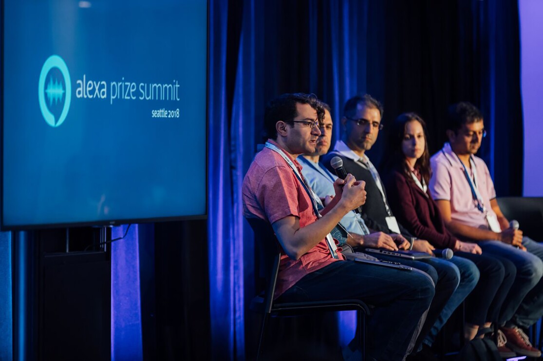 Amazon scientists, who make Alexa magic happen, speaking during a panel discussion.