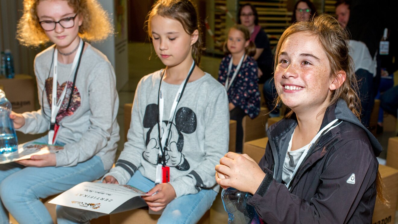 Students at community event