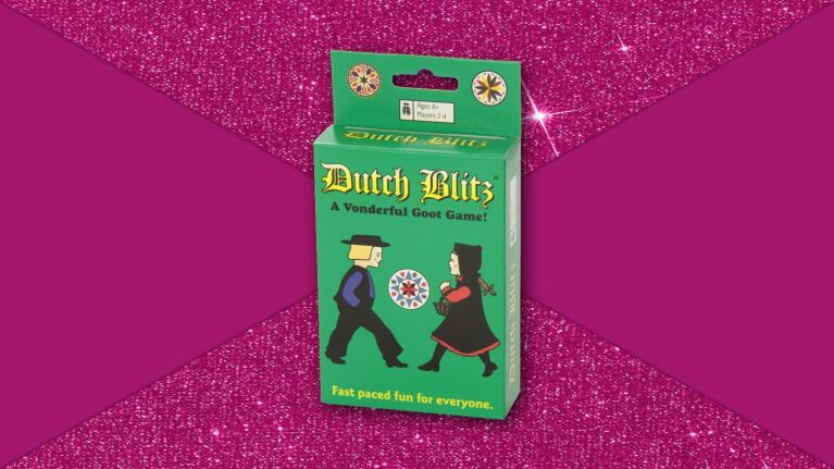 Dutch Blitz card game box on sparkly magenta background