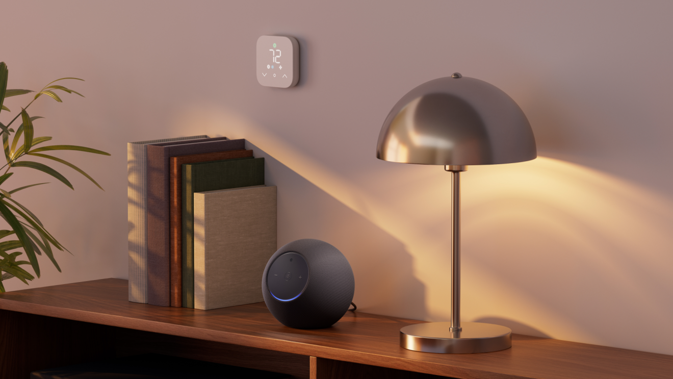 Echo Studio on top of a bookshelf.