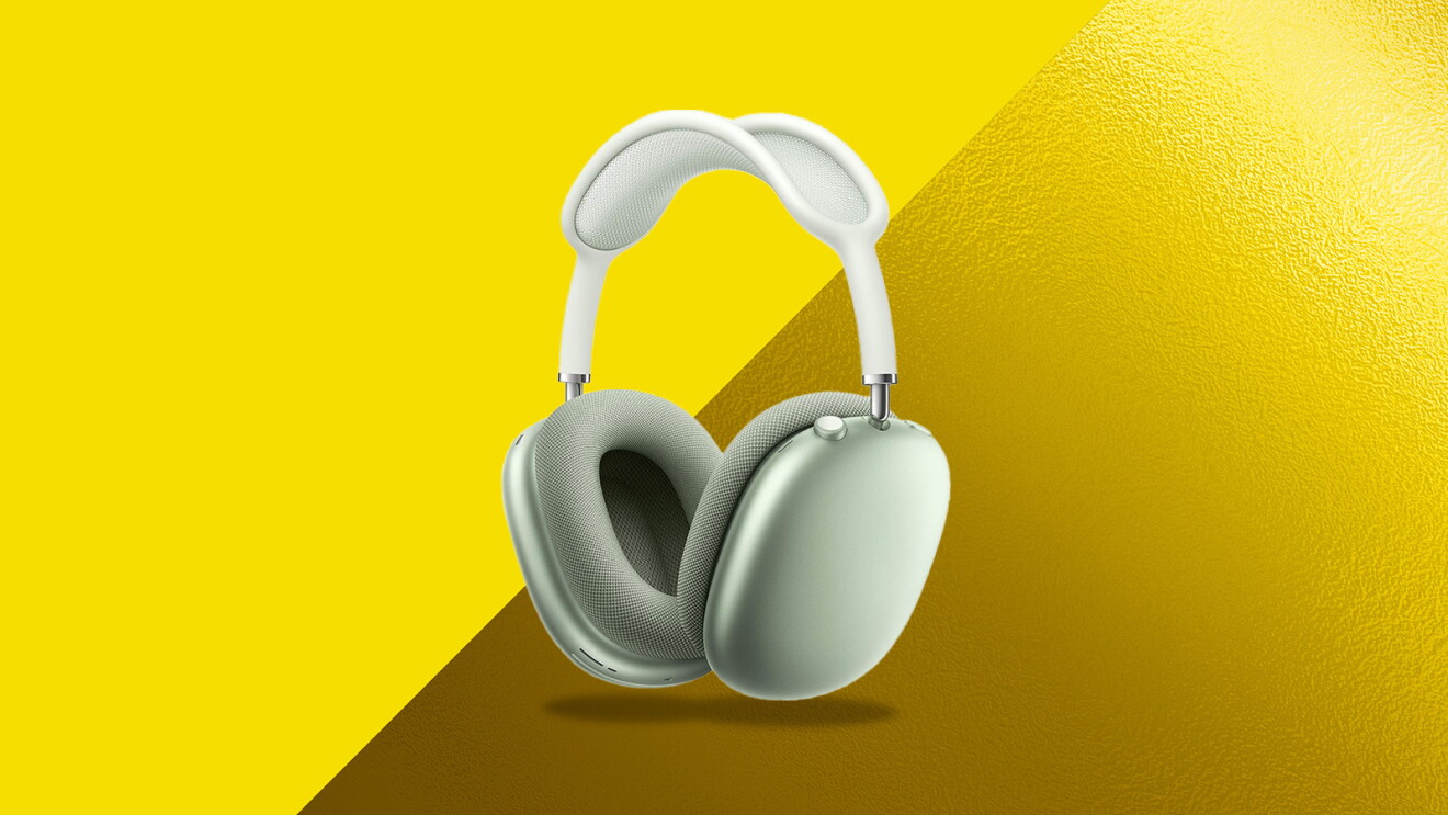 Green Apple Airpods Max wireless headphones on yellow background