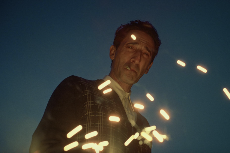 Adrien Brody in a still from The Brutalist