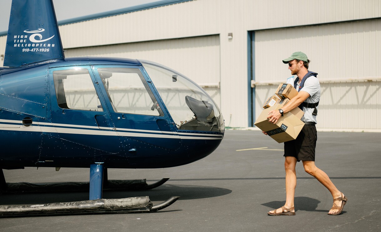 Images from the video of the process of delivering an Amazon package off the coast.