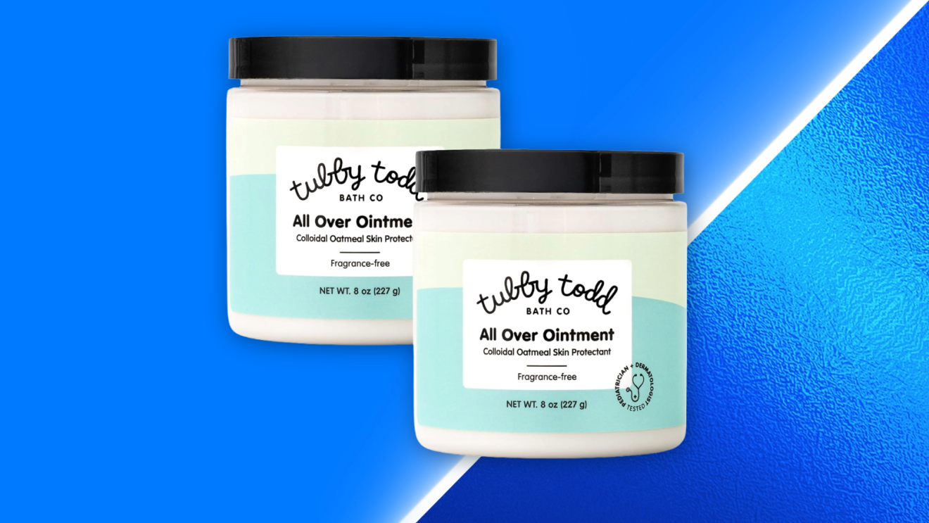 Two bottles of Tubby Todd All Over Ointment against a vibrant blue background.