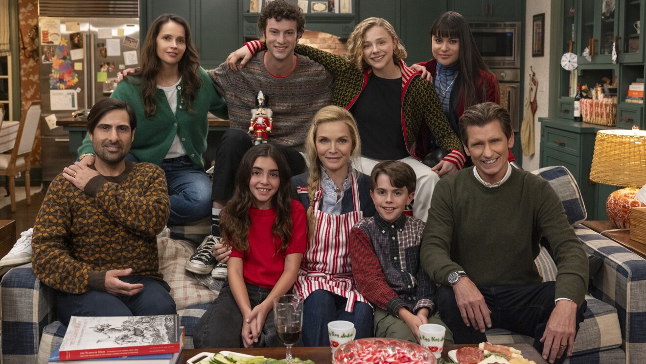 Cheerful ensemble in casual attire enjoying family time at home