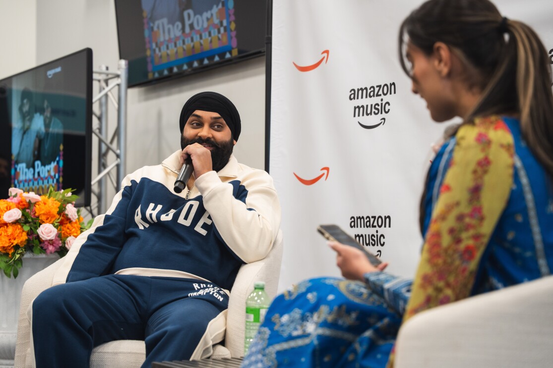 Nattan speaking into a microphone at YVR4