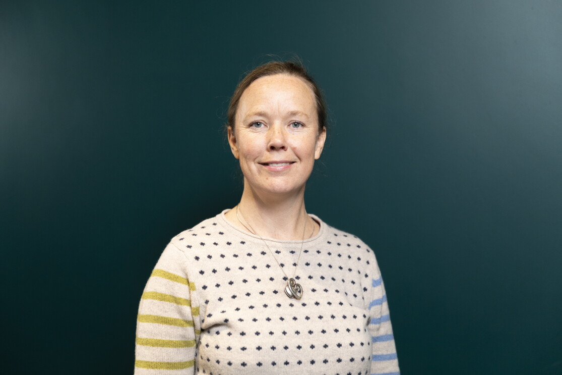 Headshot of Jennifer O’Dowd, Premium Support Operations Manager, AWS. She is smiling and looking into the camera.