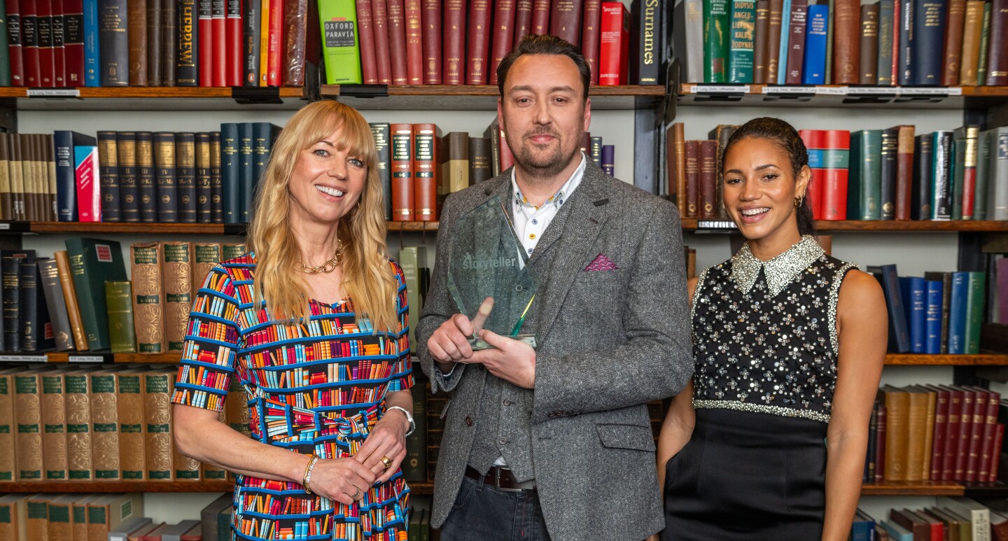Sara Cox, JD Kirk and Vick Hope celebrating JD Kirk as the winner of the Kindle Storyteller Award 2024 for his book, Stateside at a ceremony at The London Library