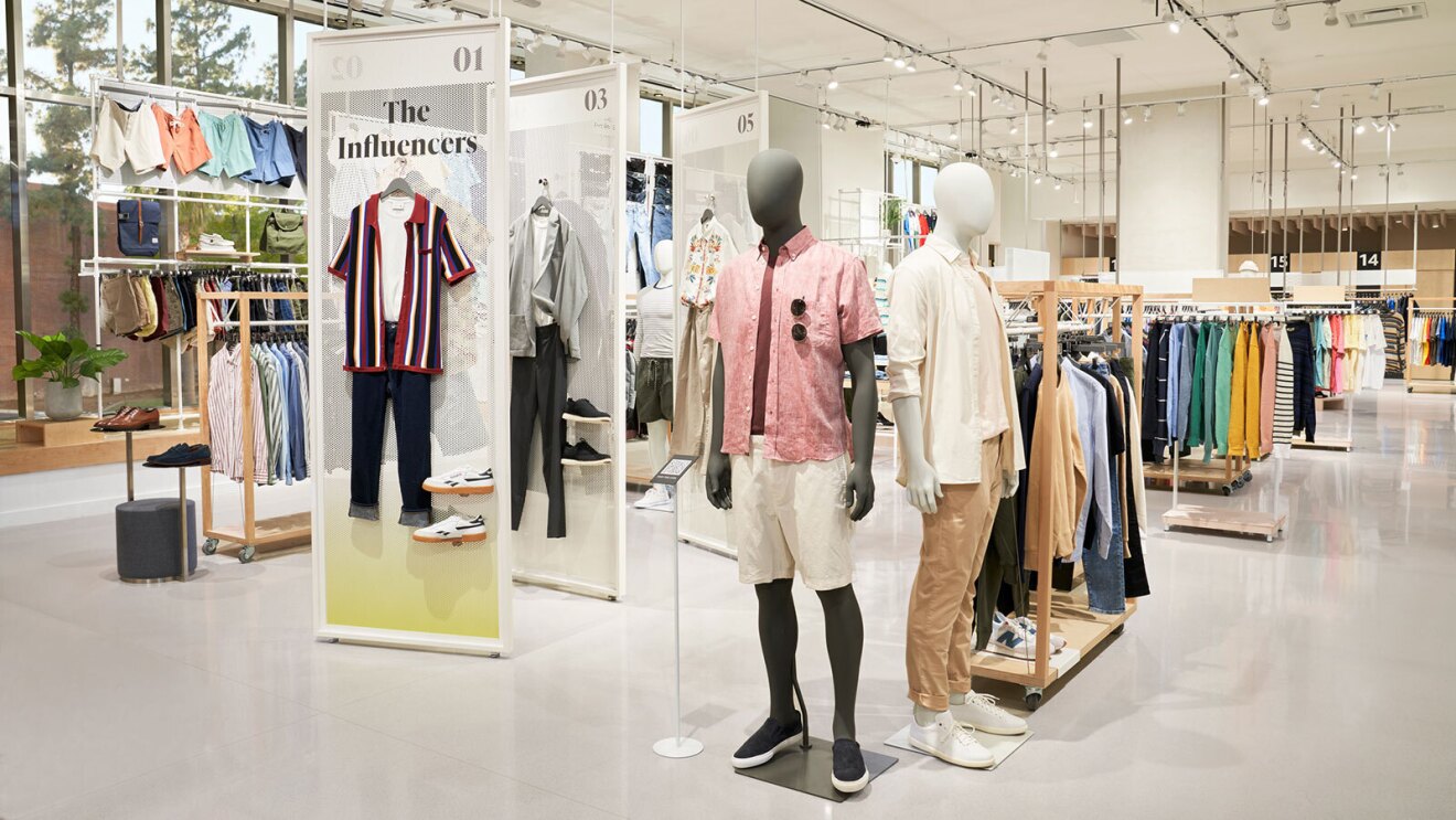 An image of an Amazon Style clothing store. There are clothing racks and mannequins displaying summer clothing.