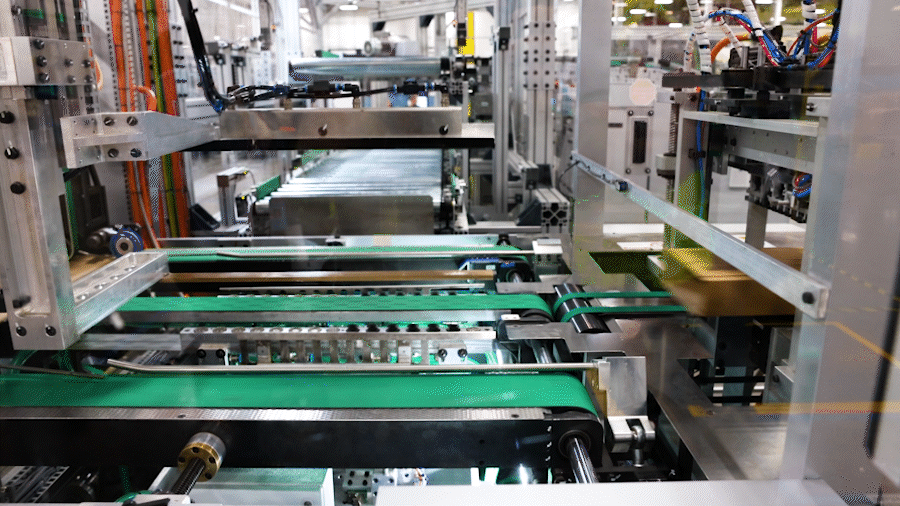 Amazon's Packaging Innovation system efficiently packs customers' orders before shipment.