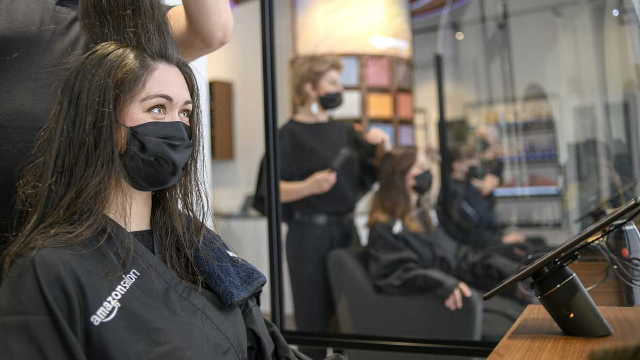 Woman having hair styled at Amazon Salon
