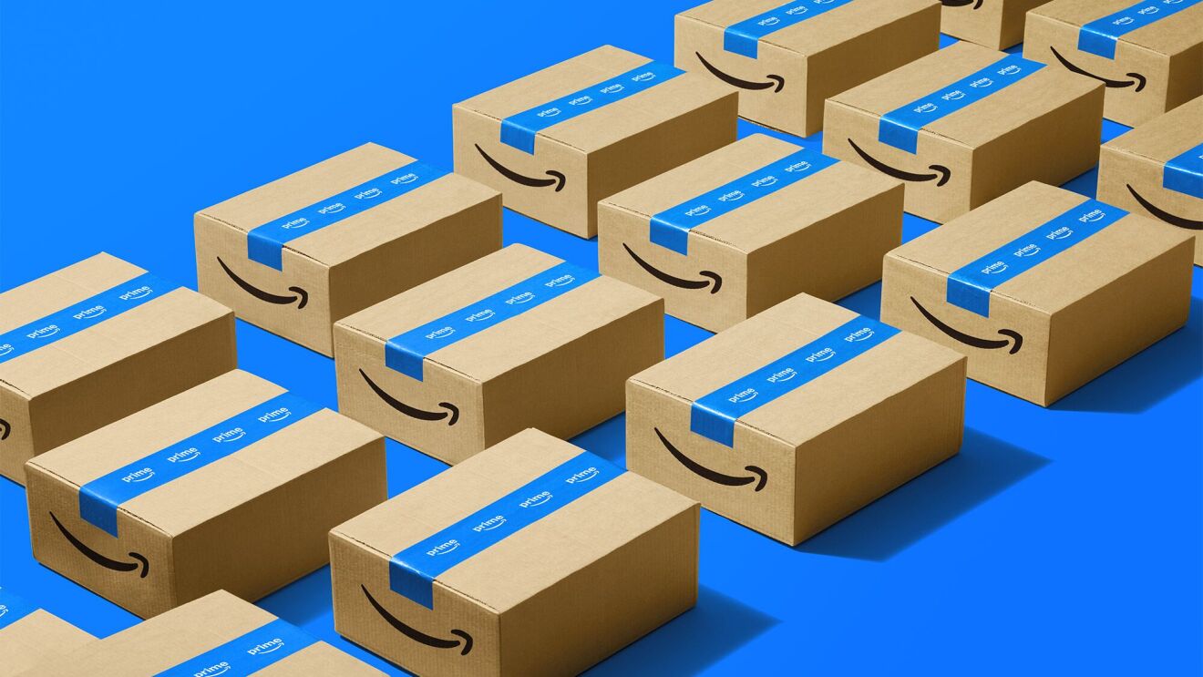 Multiple Amazon Prime shipping boxes arranged neatly on blue background