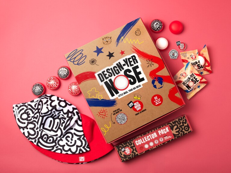 A hat, a collector pack and some badges